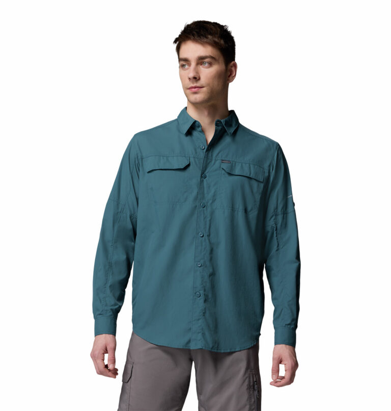 a man wearing a blue long sleeve shirt