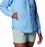 a woman wearing a blue shirt