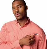 a man wearing a pink shirt
