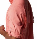 a man wearing a pink shirt