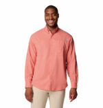 a man wearing a pink shirt