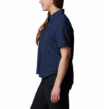 a woman wearing a blue shirt