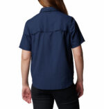 a woman wearing a blue shirt
