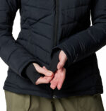 a woman in a black jacket