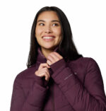 a woman wearing a red jacket