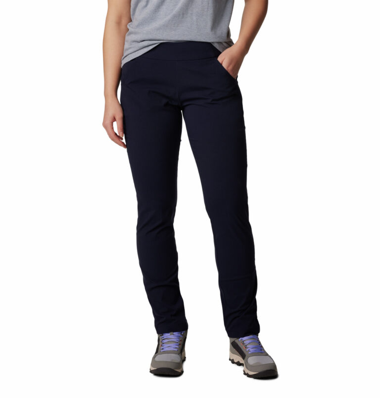 A women in a dark blue pants front view