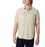 A Man in a brown shirt front view