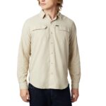 A Man in a brown shirt front view