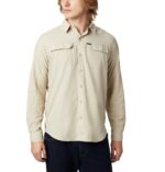 A Man in a brown shirt front view