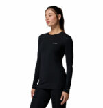 a women wearing a black Midweight Stretch Long Sleeve Top
