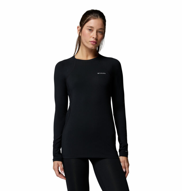 a women wearing a black Midweight Stretch Long Sleeve Top