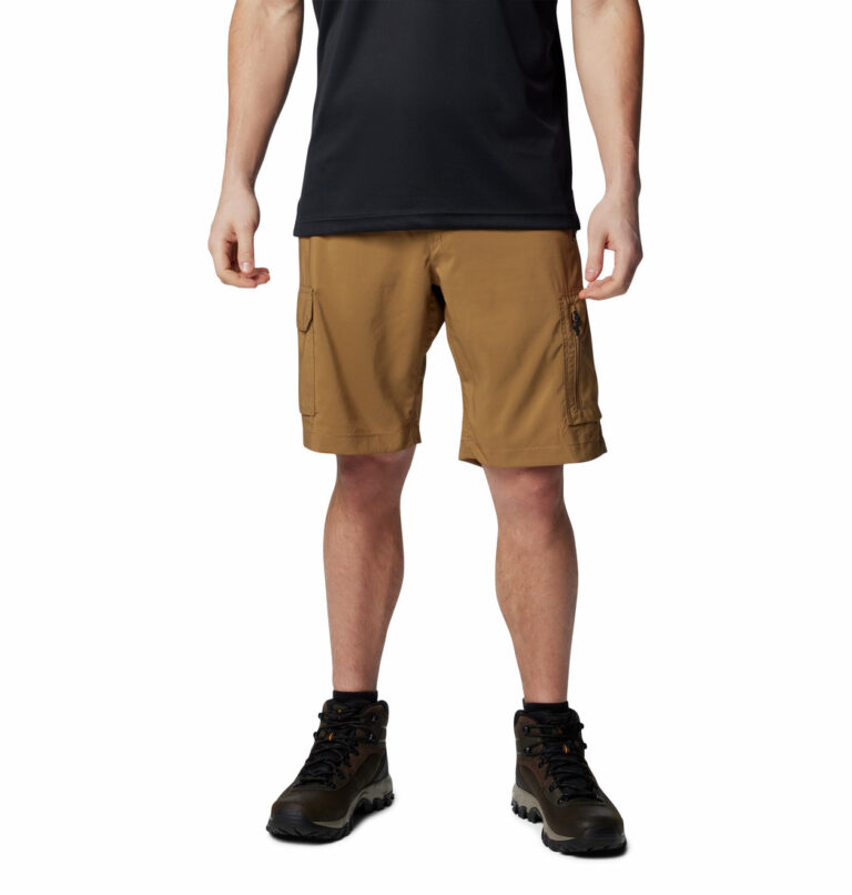 a man wearing shorts and black shirt