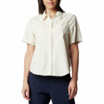 a woman in a white shirt