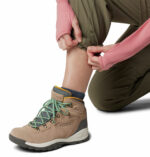 a person tying up their pants