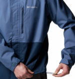 A close of of a Man in a blue jacket front View