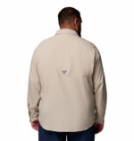 a man wearing a brown PFG Tamiami II Long Sleeve Shirt
