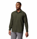 a man wearing a green silver ridge utility lite long sleeve shirt