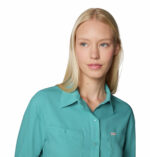 Women in blue long sleeve shirt front view close up