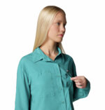 Women in blue long sleeve shirt side view close up