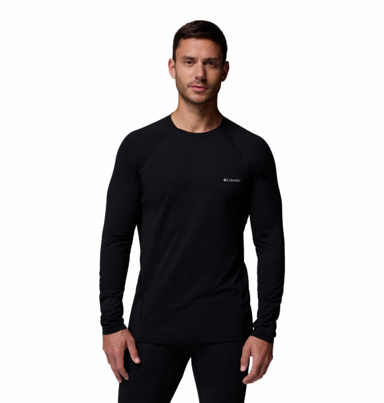 a man wearing a black top