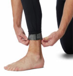 a man wearing black tights