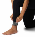 a women wearing black tights