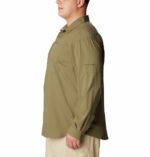 a man wearing a brown shirt