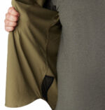 a man wearing a brown shirt
