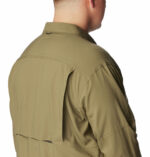 a man wearing a brown shirt