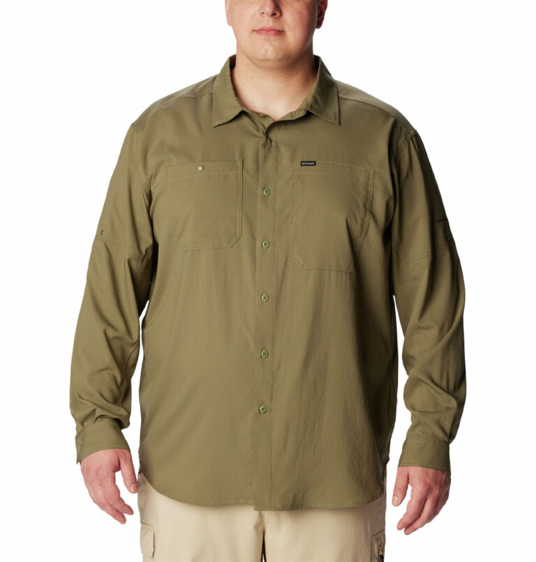 a man wearing a brown shirt