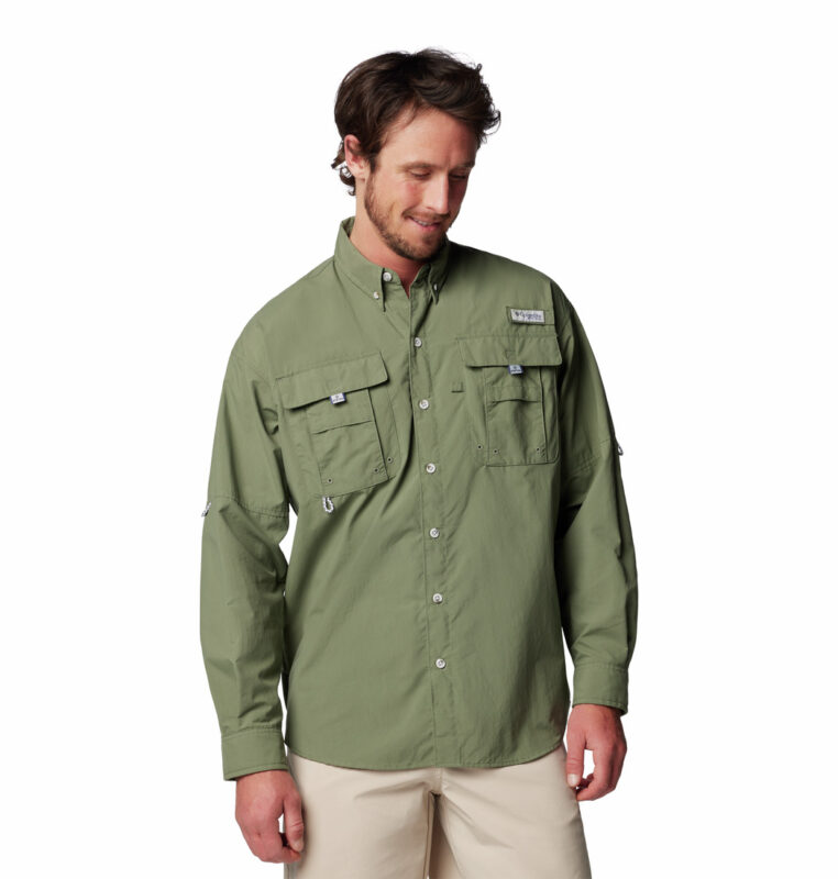 a man wearing a brown long sleeve shirt