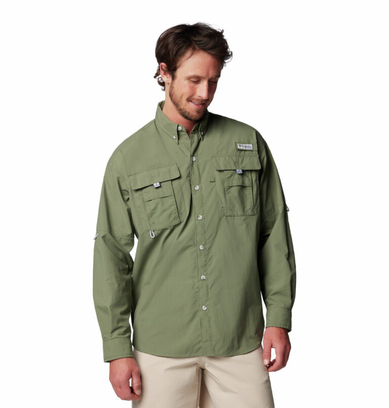 a man wearing a brown long sleeve shirt
