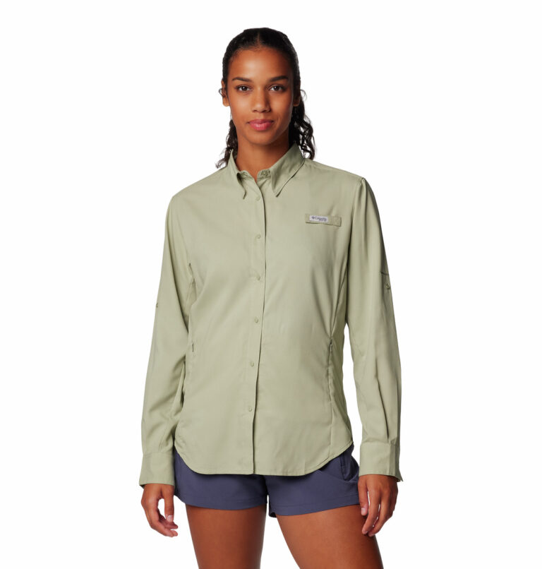 a women wearing a brown long sleeve shirt