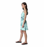 a women wearing a blue floral dress
