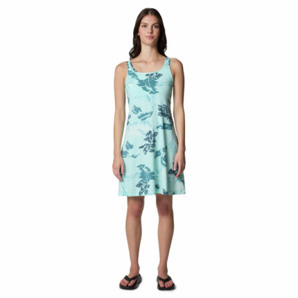 a women wearing a blue floral dress