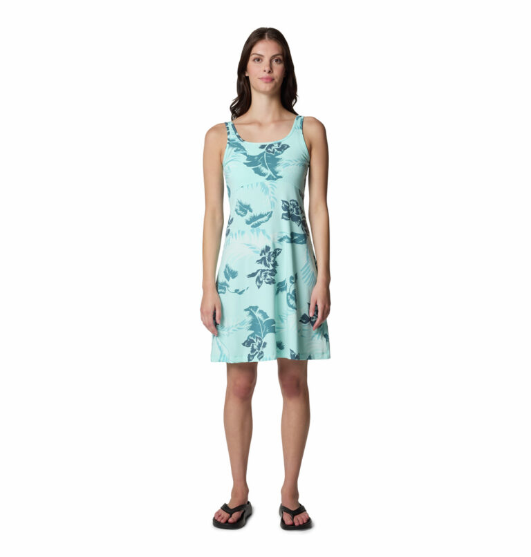 a women wearing a blue floral dress