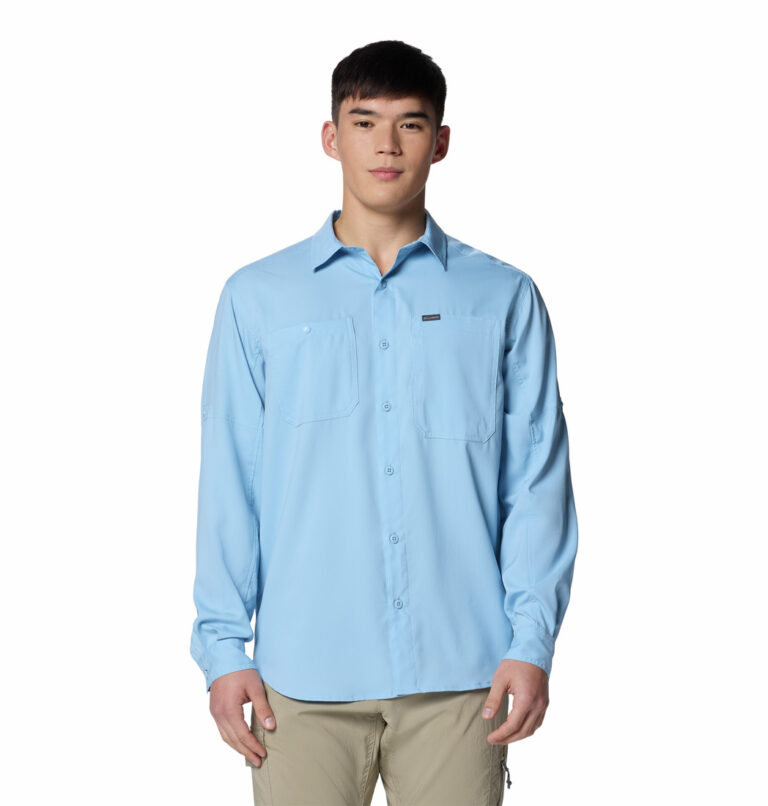 a man wearing a blue long sleeve shirt