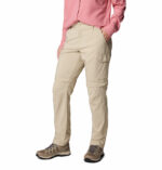 a women wearing brown convertible pants