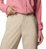 a women wearing brown convertible pants
