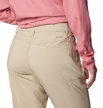 a women wearing brown convertible pants