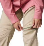 a women wearing brown convertible pants