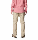 a women wearing brown convertible pants