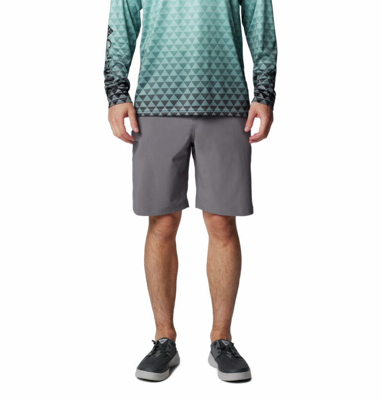 a man wearing grey shorts