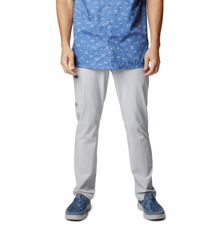 a man wearing grey PFG Terminal Tackle II pants