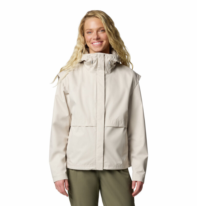 a women wearing a brown windbreaker jacket