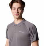 a man wearing a grey polo shirt