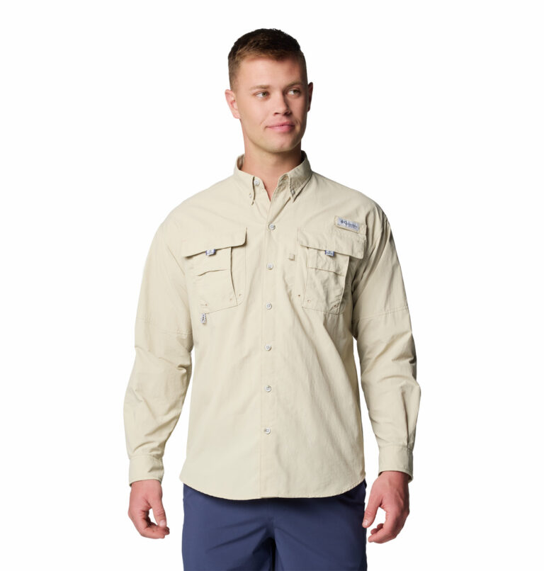 a man wearing a brown long sleeve shirt