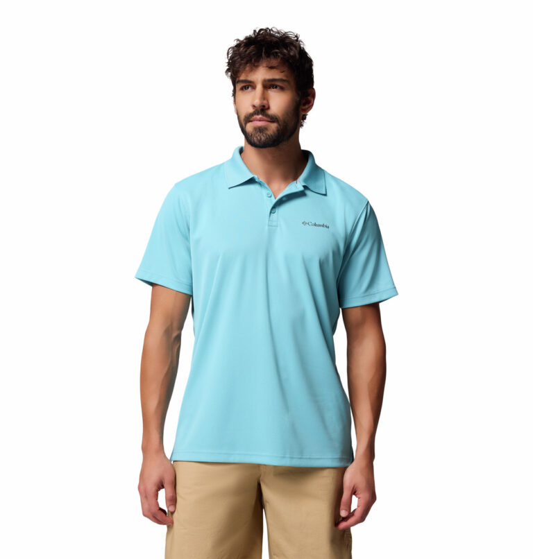 A man wearing a blue polo shirt