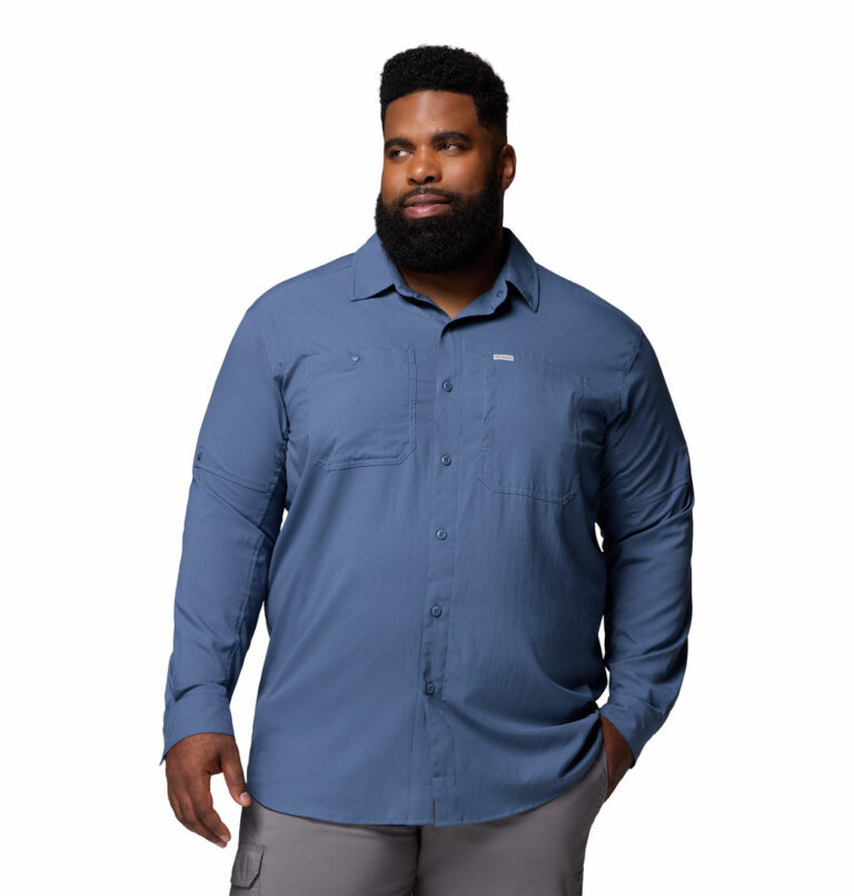 a man wearing a blue long sleeve shirt