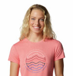 A women wearing a pink graphic t-shirt